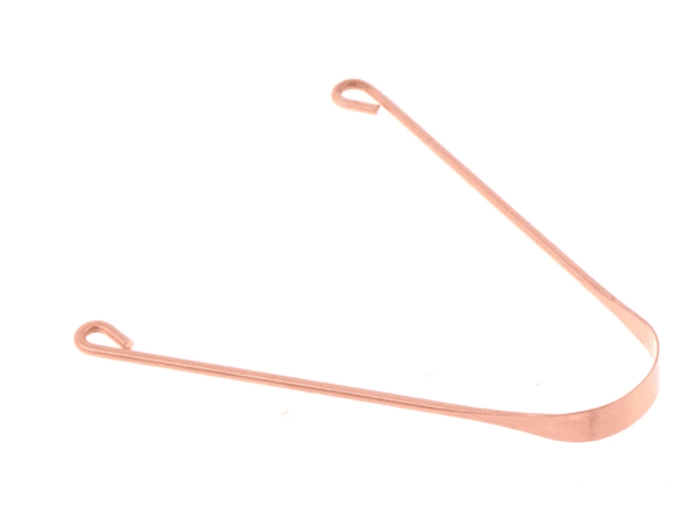 A copper tongue scraper